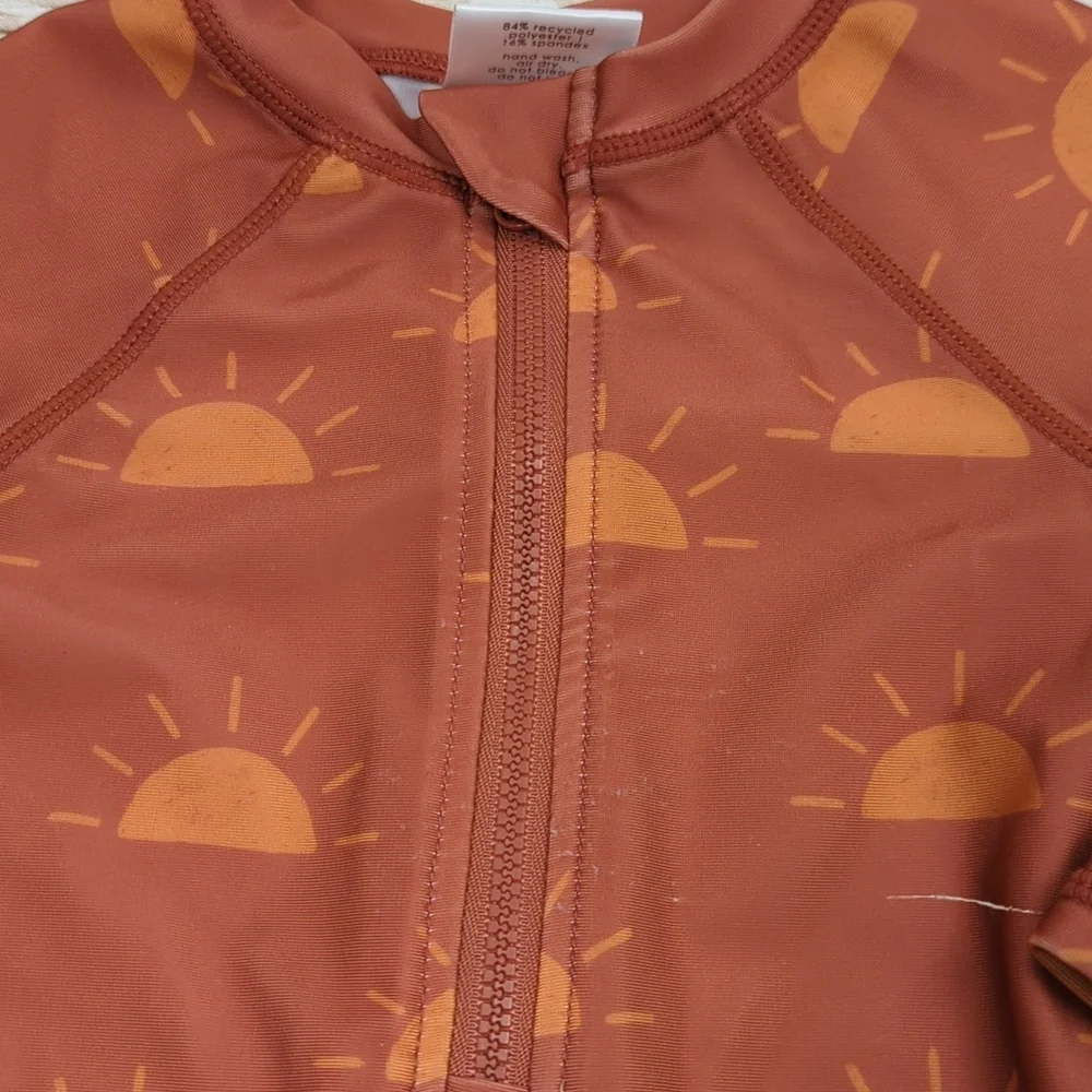 Kids Rust Orange Sun Print One-Piece Swimsuit - Long Sleeve
